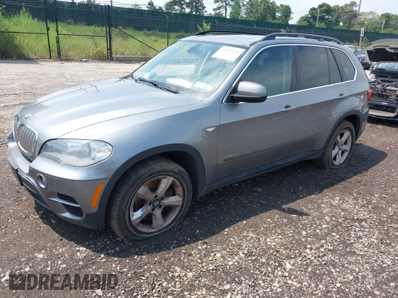 2013 BMW X5 xDrive50i with VIN 5UXZV8C58D0C16717, listed as a IAAI auction lot 42627144 with 165,724 mi miles and . Bid and sale history available at DreamBid. Image 2.