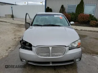 2002 Nissan Maxima GXE with VIN JN1DA31D82T400166, listed as a Copart auction lot 51148875 with 95,487 mi miles and Non repairable. Bid and sale history available at DreamBid. Image 5.