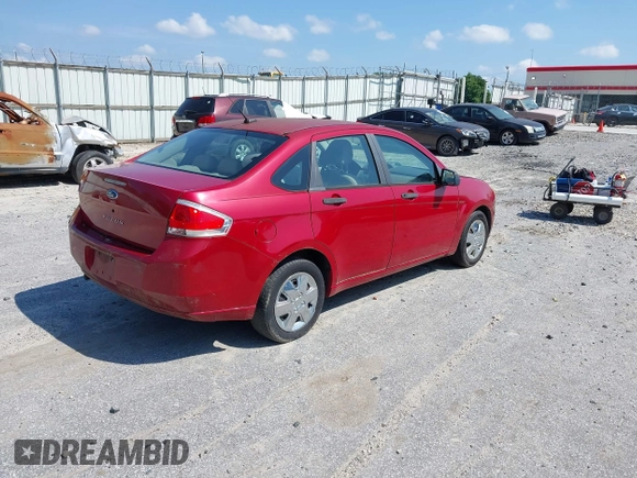 2009 Ford Focus S with VIN 1FAHP34N69W102568, listed as a IAAI auction lot 42137185 with 113,099 mi miles. Bid and sale history available at carsss.com. Image 4.