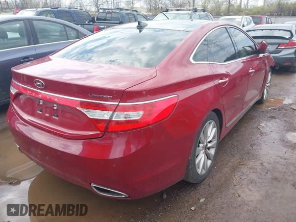 2014 Hyundai Azera Limited with VIN KMHFH4JG9EA419547, listed as a IAAI auction lot 41906777 with 134,100 mi miles and . Bid and sale history available at DreamBid. Image 4.