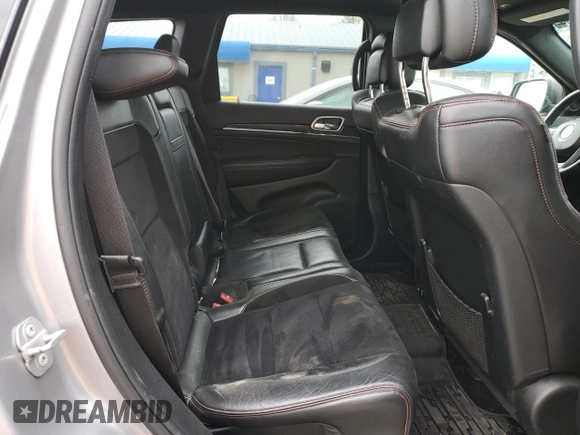 2018 Jeep Grand Cherokee Trailhawk with VIN 1C4RJFLG8JC164774, listed as a Copart auction lot 51699845 with 104,467 mi miles and Salvage title. Bid and sale history available at DreamBid. Image 11.