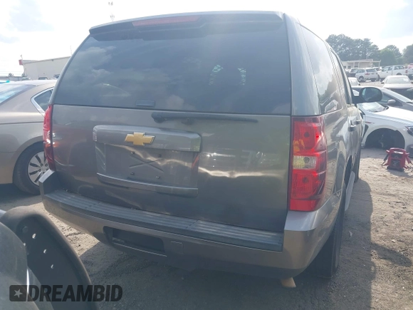 2012 Chevrolet Tahoe Commercial with VIN 1GNLC2E07CR187432, listed as a IAAI auction lot 42126539 with 169,607 mi miles and . Bid and sale history available at DreamBid. Image 16.