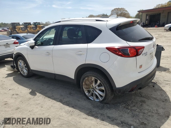 2015 Mazda CX-5 Grand Touring with VIN JM3KE4DY0F0458719, listed as a Copart auction lot 52960365 with 128,372 mi miles and Salvage Title. Bid and sale history available at DreamBid. Image 2.