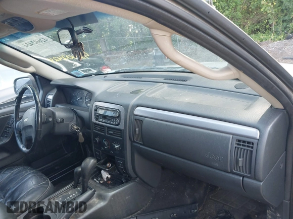 2002 Jeep Grand Cherokee Laredo z VIN 1J4GW48S62C261154, wystawiony jako IAAI lot #42602424 z przebiegiem 160 295 mil mil oraz . Historia ofert i sprzedaży dostępna na DreamBid. Obrazek 5.