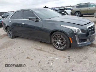 2014 Cadillac CTS Vsport Premium RWD with VIN 1G6AV5S8XE0175517, listed as a IAAI auction lot 41126885 with 140,667 mi miles and . Bid and sale history available at carsss.com. Image 1.