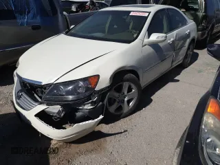 2005 Acura RL z VIN JH4KB16505C015405, wystawiony jako Copart lot #54626205 z przebiegiem 124 416 mil mil oraz Nie do naprawy • Non repairable. Historia ofert i sprzedaży dostępna na DreamBid. Obrazek 1.