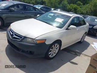 2007 Acura TSX with VIN JH4CL96817C018231, listed as a IAAI auction lot 42575936 with Not provided miles and . Bid and sale history available at DreamBid. Image 2.