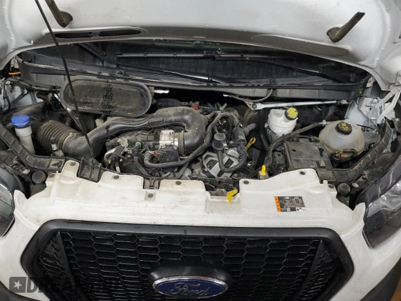 2023 Ford Transit Cargo with VIN 1FTBR3U89PKA70899, listed as a Copart auction lot 77940504 with 62,196 mi miles and Clean Title. Bid and sale history available at DreamBid. Image 12.