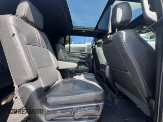 2021 Chevrolet Suburban RST z VIN 1GNSCEKD7MR335410, wystawiony jako Copart lot #59538955 z przebiegiem 184 730 mil mil oraz Czysty tytuł • Clean title. Historia ofert i sprzedaży dostępna na DreamBid. Obrazek 8.
