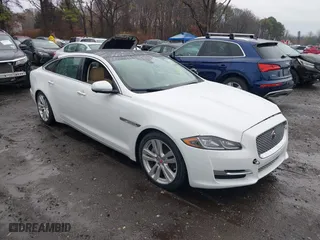 2017 Jaguar XJ with VIN SAJWA2G73H8W04310, listed as a IAAI auction lot 40914491 with 62,102 mi miles. Bid and sale history available at carsss.com. Image 1.