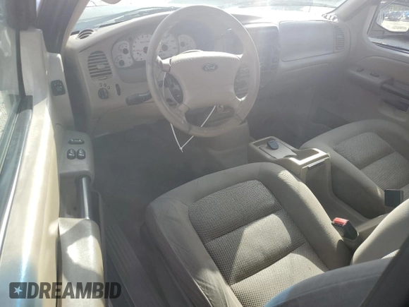 2003 Ford Explorer Sport XLS z VIN 1FMYU60EX3UA56154, wystawiony jako Copart lot #82259834 z przebiegiem 188 417 mil mil oraz Szkody całkowita. Historia ofert i sprzedaży dostępna na DreamBid. Obrazek 8.