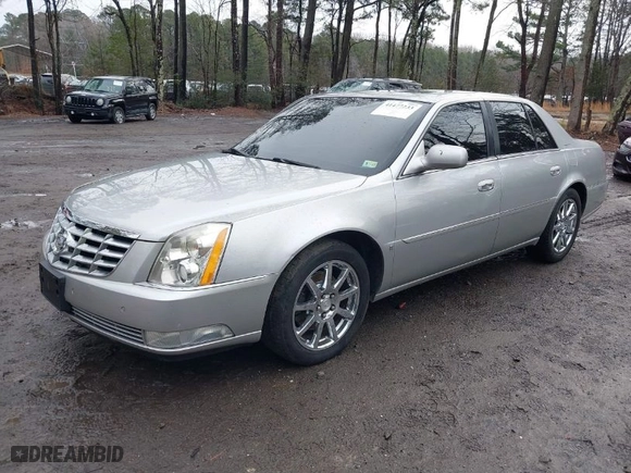 2008 Cadillac DTS w/1SE with VIN 1G6KD57918U155128, listed as a IAAI auction lot 41477233 with 123,479 mi miles. Bid and sale history available at carsss.com. Image 2.