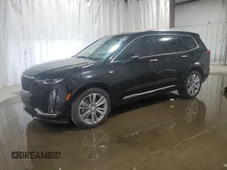 2023 Cadillac XT6 AWD Premium Luxury z VIN 1GYKPDRS6PZ129957, wystawiony jako Copart lot #58808245 z przebiegiem Nie podano mil oraz Czysty tytuł • Clean title. Historia ofert i sprzedaży dostępna na DreamBid. Obrazek 1.