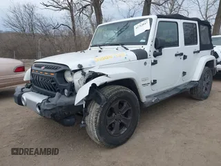 2014 Jeep Wrangler Unlimited Sahara with VIN 1C4BJWEGXEL326585, listed as a IAAI auction lot 41712047 with 155,973 mi miles. Bid and sale history available at carsss.com. Image 6.