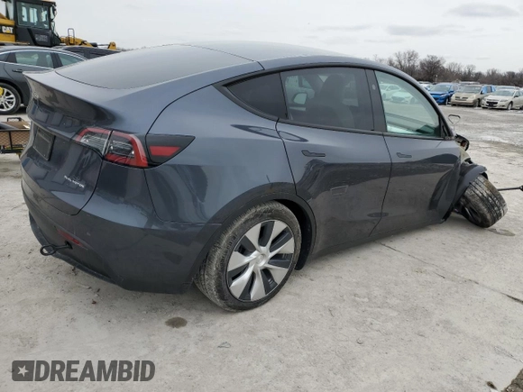 2023 Tesla Model Y Long Range z VIN 7SAYGDEE8PF884567, wystawiony jako Copart lot #45181465 z przebiegiem 16 653 mil mil oraz Szkoda całkowita • Salvage title. Historia ofert i sprzedaży dostępna na DreamBid. Obrazek 3.
