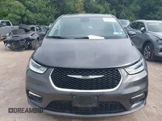 2023 Chrysler Pacifica Touring L with VIN 2C4RC1BG8PR594481, listed as a IAAI auction lot 42618839 with 60,748 mi miles and . Bid and sale history available at DreamBid. Image 12.