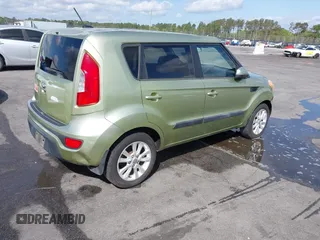 2013 Kia Soul + with VIN KNDJT2A69D7543130, listed as a IAAI auction lot 41914445 with 127,489 mi miles. Bid and sale history available at carsss.com. Image 4.