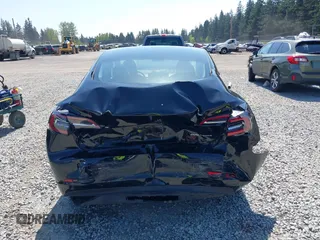 2022 Tesla Model 3 Long Range with VIN 5YJ3E1EB7NF241996, listed as a IAAI auction lot 42115915 with 23,433 mi miles and . Bid and sale history available at DreamBid. Image 16.