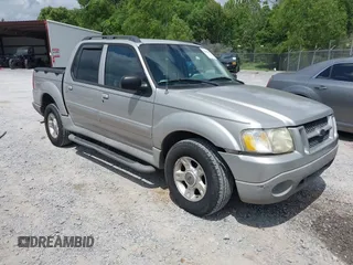 2003 Ford Explorer Sport Trac XLS z VIN 1FMZU77E23UA64779, wystawiony jako IAAI lot #42241409 z przebiegiem 212 608 mil mil oraz . Historia ofert i sprzedaży dostępna na DreamBid. Obrazek 1.