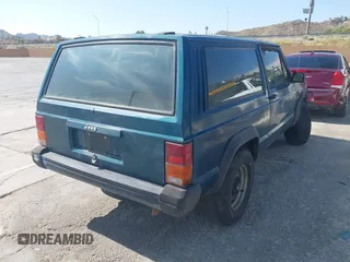 1996 Jeep Cherokee SE with VIN 1J4FT27P4TL309029, listed as a IAAI auction lot 42476830 with Not provided miles and . Bid and sale history available at DreamBid. Image 4.