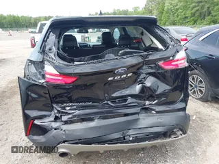 2021 Ford Edge Titanium z VIN 2FMPK3K99MBA16882, wystawiony jako IAAI lot #42214606 z przebiegiem 140 031 mil mil oraz . Historia ofert i sprzedaży dostępna na DreamBid. Obrazek 18.