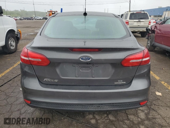 2016 Ford Focus SE with VIN 1FADP3F24GL312246, listed as a Copart auction lot 58564955 with 146,598 mi miles and Clean title. Bid and sale history available at DreamBid. Image 6.