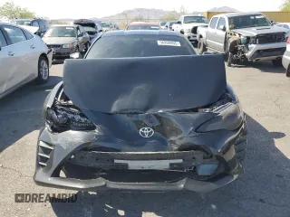 2017 Toyota 86 с VIN JF1ZNAA11H8703552, выставлен на аукционе Copart как лот 56208805 с пробегом 92 854 миль миль и Списание • Salvage title. История ставок и продаж доступна на DreamBid. Изображение 5.