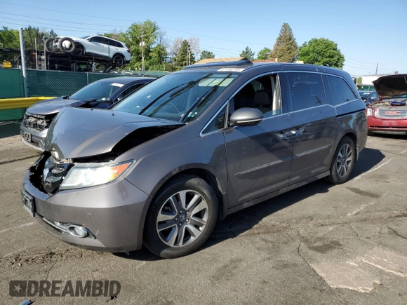 2016 Honda Odyssey Touring Elite with VIN 5FNRL5H91GB092214, listed as a Copart auction lot 61158745 with 121,477 mi miles and Salvage title. Bid and sale history available at DreamBid. Image 1.