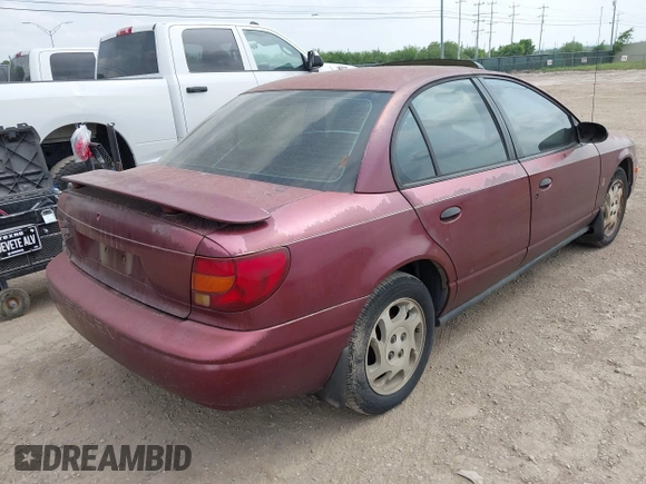 2002 Saturn SL z VIN 1G8ZF52802Z248375, wystawiony jako IAAI lot #42180352 z przebiegiem Nie podano mil oraz . Historia ofert i sprzedaży dostępna na DreamBid. Obrazek 4.