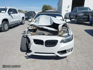 2015 BMW 2 Series 228i with VIN WBA1K5C50FV474011, listed as a IAAI auction lot 41805879 with 83,489 mi miles. Bid and sale history available at carsss.com. Image 11.