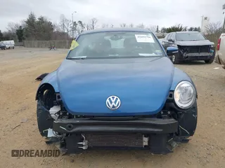 2019 Volkswagen Beetle S with VIN 3VWFD7AT8KM708865, listed as a IAAI auction lot 41692756 with 35,070 mi miles. Bid and sale history available at carsss.com. Image 13.