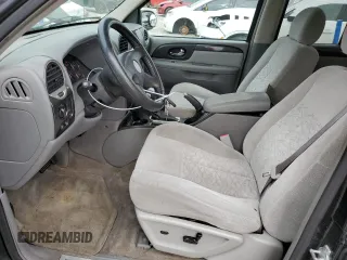 2006 GMC Envoy SLT with VIN 1GKDS13SX62354690, listed as a Copart auction lot 84138814 with 194,669 mi miles and Salvage Title. Bid and sale history available at carsss.com. Image 7.