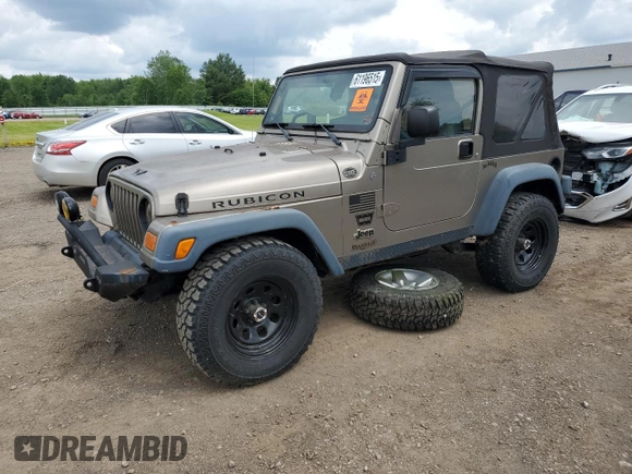 2004 Jeep Wrangler Rubicon z VIN 1J4FA69S24P713388, wystawiony jako Copart lot #61196515 z przebiegiem 155 092 mil mil oraz Czysty tytuł • Clean title. Historia ofert i sprzedaży dostępna na DreamBid. Obrazek 1.