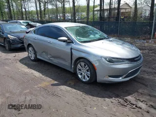 2015 Chrysler 200 Limited with VIN 1C3CCCAB9FN553199, listed as a IAAI auction lot 41988732 with 136,992 mi miles. Bid and sale history available at carsss.com. Image 1.