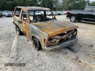 1986 Ford Bronco z VIN 1FMCU14TXGUD18203, wystawiony jako Copart lot #47194155 z przebiegiem Nie podano mil oraz Czysty tytuł • Clean title. Historia ofert i sprzedaży dostępna na DreamBid. Obrazek 11.