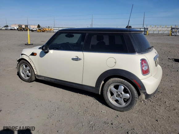 2011 MINI Cooper Hardtop with VIN WMWSU3C55BT182427, listed as a Copart auction lot 53084385 with 144,737 mi miles and Salvage Title. Bid and sale history available at carsss.com. Image 2.