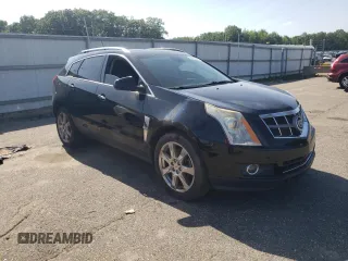 2011 Cadillac SRX Premium Collection with VIN 3GYFNFEYXBS547540, listed as a Copart auction lot 62563895 with 107,136 mi miles and Salvage title. Bid and sale history available at DreamBid. Image 4.