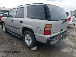 2004 Chevrolet Tahoe LT z VIN 1GNEC13Z24J220275, wystawiony jako IAAI lot #42142833 z przebiegiem 271 725 mil mil oraz . Historia ofert i sprzedaży dostępna na DreamBid. Obrazek 3.