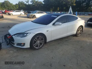 2013 Tesla Model S Performance z VIN 5YJSA1CP9DFP21848, wystawiony jako Copart lot #64877615 z przebiegiem 151 319 mil mil oraz Czysty tytuł • Clean title. Historia ofert i sprzedaży dostępna na DreamBid. Obrazek 1.