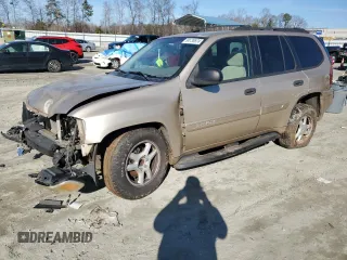 2004 GMC Envoy SLT with VIN 1GKDS13S442209545, listed as a Copart auction lot 84736874 with 255,371 mi miles and Salvage Title. Bid and sale history available at carsss.com. Image 1.