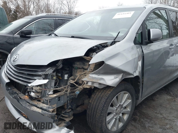 2012 Toyota Sienna XLE with VIN 5TDDK3DC9CS037616, listed as a IAAI auction lot 41435361 with 250,043 mi miles. Bid and sale history available at carsss.com. Image 6.