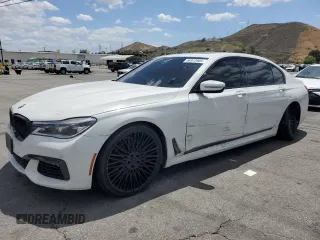 2016 BMW 7 Series 750i z VIN WBA7F0C56GGL99130, wystawiony jako Copart lot #56972905 z przebiegiem 100 556 mil mil oraz Czysty tytuł • Clean title. Historia ofert i sprzedaży dostępna na DreamBid. Obrazek 1.