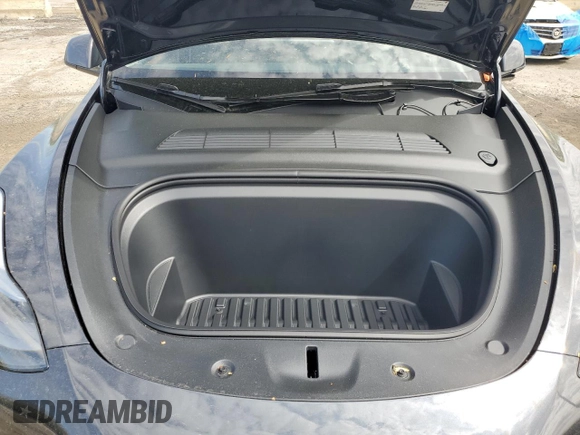 2025 Tesla Model Y Long Range with VIN 7SAYGDED7SF320702, listed as a Copart auction lot 54655325 with 1,169 mi miles and Salvage Title. Bid and sale history available at DreamBid. Image 11.