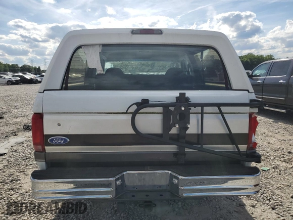1993 Ford Bronco XL with VIN 1FMEU15N1PLB26957, listed as a Copart auction lot 54689034 with Not provided miles and Salvage title. Bid and sale history available at DreamBid. Image 6.