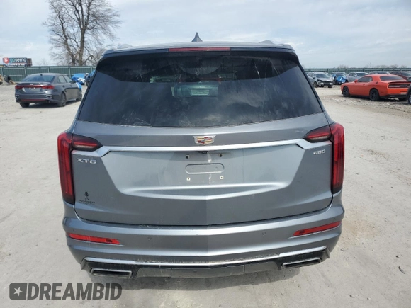 2022 Cadillac XT6 Premium Luxury with VIN 1GYKPCRS5NZ114583, listed as a Copart auction lot 46507155 with 70,506 mi miles and Salvage title. Bid and sale history available at DreamBid. Image 6.