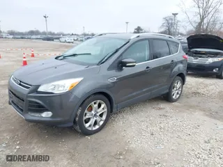 2015 Ford Escape Titanium with VIN 1FMCU0JX8FUC33649, listed as a IAAI auction lot 41992427 with 128,757 mi miles. Bid and sale history available at carsss.com. Image 17.
