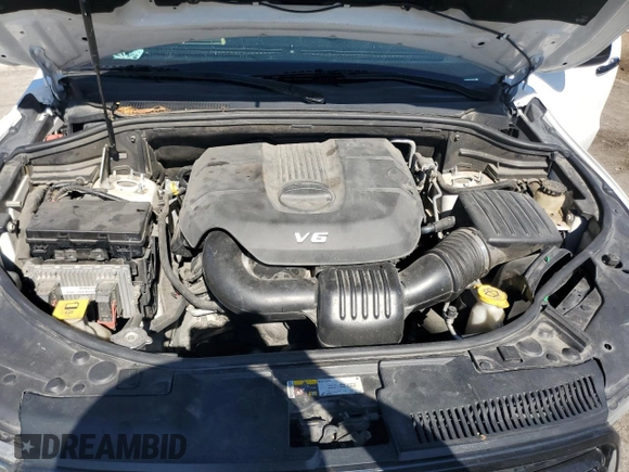2014 Dodge Durango SXT with VIN 1C4RDHAG0EC972094, listed as a Copart auction lot 77396084 with 189,425 mi miles and Salvage Title. Bid and sale history available at DreamBid. Image 12.