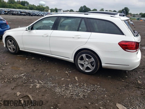 2014 Mercedes-Benz E 350 Luxury with VIN WDDHH8JBXEA803917, listed as a Copart auction lot 80199464 with 108,800 mi miles and Salvage Title. Bid and sale history available at DreamBid. Image 2.
