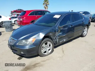 2006 Acura RL z VIN JH4KB16516C004396, wystawiony jako IAAI lot #41959850 z przebiegiem 114 670 mil mil oraz . Historia ofert i sprzedaży dostępna na DreamBid. Obrazek 16.