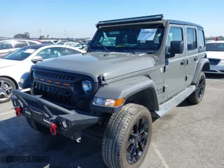 2020 Jeep Wrangler Unlimited North Edition with VIN 1C4HJXEN7LW114639, listed as a IAAI auction lot 41649299 with 38,277 mi miles. Bid and sale history available at carsss.com. Image 2.